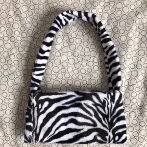 Fuzzy zebra print shoulder bag